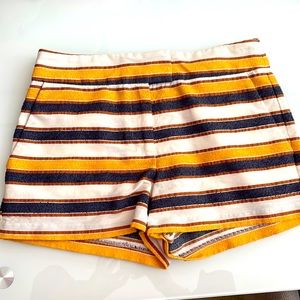Marciano shorts with horizontal cream,brown, gold and navy blue textured lines.